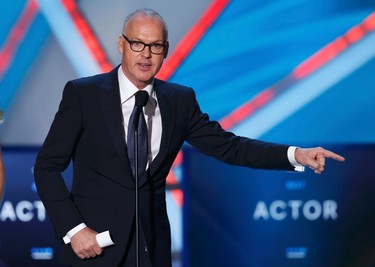 Michael Keaton accepts the award for best actor for his role in "Birdman" during the 20th Annual Critics' Choice Movie Awards in Los Angeles, California January 15, 2015.    REUTERS/Mario Anzuoni