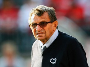 Joe Paterno will have his wins from 14 seasons as coach of Penn State's football team restored as part of a settlement. (Reuters file photo)