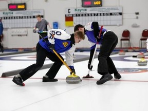 Brett Winfield (sweeping on left) and Danielle Schmiemann, who both curled in Stony Plain, each won their provincial tournament and are off to the Canadian Junior Championships later this month. - Photo Supplied