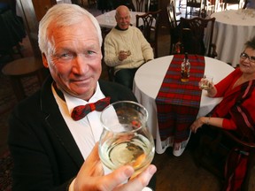 Luke Hendry/The Intelligencer
Robbie Burns Night organizers Bob Burns, foreground, Kemp Stewart and Karen Palmer raise their glasses at the Belleville Club Friday. Their Single Malt Society will hold their third-annual Scotch tasting and Robbie Burns dinner Jan. 22 at the club.