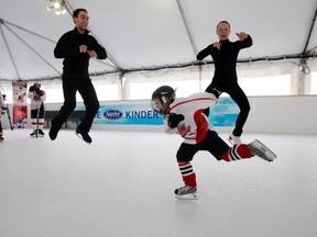 People skate on synthetic ice. (QMI Agency file photo)