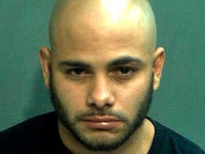 Robert Corchado, 28, is seen in a booking photo from the Orange County Jail in Orlando, Florida taken April 10, 2014.  Corchado, a Florida man described by police as a suspect in a hit-and-run crash that killed a 4-year-old girl and injured 14 people at an Orlando-area day-care center,  turned himself in to authorities at the Orange County Jail, officials said on Thursday.  REUTERS/Orange County Jail/Handout via Reuters