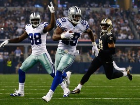 Cowboys running back DeMarco Murray (front) led the NFL in rushing yards, while Dez Bryant topped all receivers with 16 TDs. (AFP)