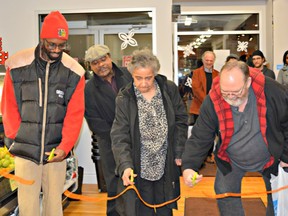 Ribbon cutting at the grand opening of the Community Carrot co-op grocery store in Halifax, December 11, 2014. (Global Voices photo)