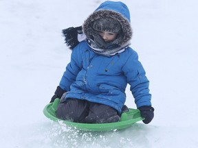 Gino Donato/The Sudbury Star
Four-year-old Logan Anderson tobbogans at Robinson Playground.