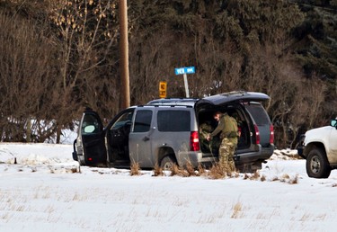 RCMP officers are on scene after two RCMP officers were shot in St. Albert, Alta., on Saturday, Jan. 17, 2015. (Codie McLachlan/QMI Agency)