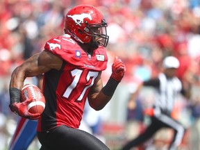 RedBlacks Maurice Price's catches a TD pass against the Montreal Alouettes last season with his former team the Calgary Stampeders. Darren Makowichuk/QMI Agency