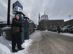 Lowertown Community Association President Liz Bernstein is shown in the back parking lot behind the Notre Dame Cathedral on Thursday Jan 15, 2015. The oldest church in the city wants City Hall's blessing to permanently keep the parking but the community association would like the land developed.  
Tony Caldwell/Ottawa Sun/QMI Agency