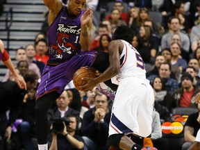 DeMar DeRozan (left) and the Raptors had no answers for DeMarre Carroll and the Hawks on Friday night at the ACC. (USATODAY/photo)