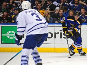 St. Louis Blues forward Alexander Steen handles the puck as Maple Leafs’ Dion Phaneuf keeps an eye on him last night. (USA TODAY)