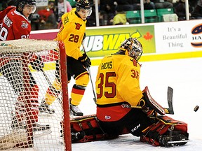 Belleville Bulls netminder Connor Hicks makes one of his 36 saves against the Oshawa Generals in an OHL contest Saturday night at Yardmen Arena. The rookie goalie was outstanding in a 4-3 O.T. loss to the high-flying Generals. (Don Carr for The Intelligencer)