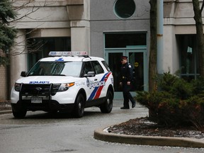 An 18-year-old man has been accused of murdering his father whose body was found at a Permberton Ave. condo in North York. (STAN BEHAL, Toronto Sun)