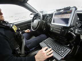 Every ping emitted from the Automated Licence Plate Recognition (ALPR) system, operated here by Quinte West OPP officer Prov. Const. John-Keith Small, means another plate number scanned and compared to a provincial database of more than 8.3 million plates on a “hotlist” of suspect licence plates. - JEROME LESSARD/THE INTELLIGENCER/QMI AGENCY