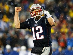 New England Patriots quarterback Tom Brady celebrates a touchdown against the Indianapolis Colts in the AFC championship game at Gillette Stadium in Foxborough, Mass.,. Jan. 18, 2015. (DAVID BUTLER II/USA Today)