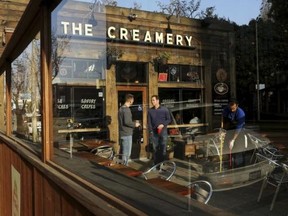 Men talk at The Creamery, located in the heart of South of Market (SoMA), in San Francisco, California January 14, 2015. REUTERS/Robert Galbraith