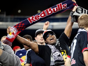 New York Red Bulls fans celebrate after the Red Bulls scored the first goal of the game against the New England Revolution in the second half at Gillette Stadium September 22, 2012 in Foxboro, Massachusetts. (Gail Oskin/Getty Images/AFP)