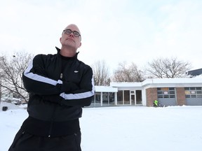 Ottawa city councillor Jeff Leiper stands at the corner of Wellington Street and Island Park Drive on Monday, Jan. 19, 2015. He is upset the city was forced into an OMB hearing about the height restrictions on a proposed development at the site. 
Tony Caldwell/Ottawa Sun/QMI Agency