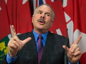 Environmental Commissioner Gord Miller holds press conference at Queens' Park to release his report on government energy efficiency  in Toronto, Ont. on Tuesday January 13, 2015. Craig Robertson/Toronto Sun/QMI Agency