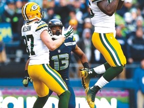 In one of the NFC championship’s most pivotal moments, the Packers’ Brandon Bostick (right) bobbles an onside kick. (AFP)