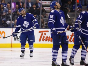 Phil Kessel and other members of the Maple Leafs look at the video board during their team's 4-1 loss to the Carolina Hurricanes at the Air Canada Centre in Toronto on Jan. 19, 2015. (MICHAEL PEAKE/Toronto Sun)