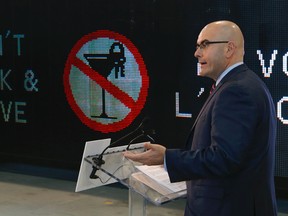 Ontario Transportation Minister Steven Del Duca unveils new highway signs at Ledstar Inc. in Vaughan on Tuesday, January 20, 2015. (Dave Thomas/Toronto Sun)