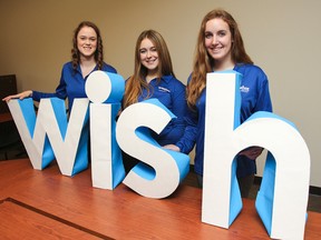 Jessica Masciangelo, Shelby Paulseth and Patricia Marks, with Students for Wishes, are seen here on Queen's University campus. The trio will host the sixth annual HaiRaiser, the main fundraiser for the Students for Wishes, held at the Cataraqui Centre on Saturday, Jan. 24, 2015.  Julia McKay/The Kingston Whig-Standard/QMI Agency
