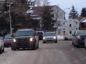 Police at the scene after a body was found Jan. 21, 2015,  near 119 Street and 25 Avenue. (EDMONTON SUN PHOTO)