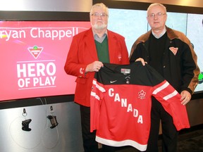 Bryan Chappell, left, was named Canadian Tire’s Hero of Play for the Hockey Canada Century Tour's visit to Sarnia. Ray McDonald, a local Canadian Tire dealer, presented Chappell with a We All Play For Canada jacket and a 100th anniversary Hockey Canada commemorative jersey. (TERRY BRIDGE, The Observer)