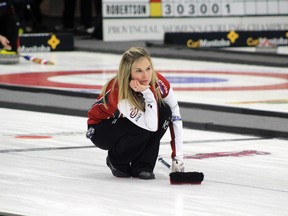 Jennifer Jones watches her rock during first draw action at the Scotties Tournament of Hearts provincial championship in Winkler, January 21, 2015, against Terry Ursel.