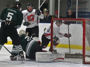 Gananoque Islanders' Ryosuke Kobayashi watches the puck hit the back of the net as he scores the only goal for the Islanders in a 7-1 loss to the Westport Rideaus in an Eastern Ontario Junior Hockey League matchup at the Lou Jeffries, Gananoque and T.L.T.I. Recreation Centre on Sunday, Jan. 18, 2015.​​