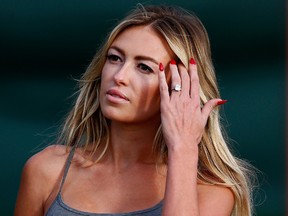Paulina Gretzky watches the play of Dustin Johnson during round one of the Hyundai Tournament of Champions at the Plantation Course at Kapalua Golf Club on January 3, 2014 in Lahaina, Hawaii. (Tom Pennington/Getty Images/AFP)