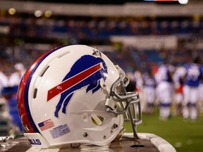 A helmet for the Buffalo Bills sits on the sidelines during the second half of a preseason game against the Detroit Lions at Ralph Wilson Stadium on August 28, 2014. (Michael Adamucci/Getty Images/AFP)
