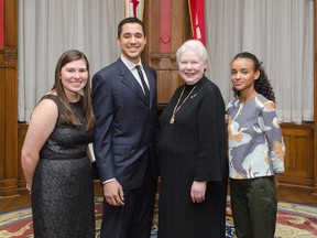 Recipients of awards for helping to end racial discrimination handed out on the first national Lincoln Alexander Day Wednesday, Jan. 21, 2014, from left, Madison Goodwill, 18, from Owen Sound, Zuberi Attard, 18, of Thornhill, Lt.-Gov. Elizabeth Dowdeswell, and Yosra Musa, 21, from Hamilton