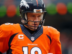 Peyton Manning hasn't decided yet whether he'll come back for a fourth year with the Broncos. (USA TODAY)