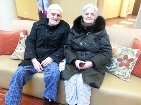 David and Gayle Whittaker were still in their pyjamas when the Chimo Hotel in Ottawa was evacuated because of a chemical scare. A Nova Scotia man was arrested in the incident. (Keaton Robbins/Ottawa Sun)