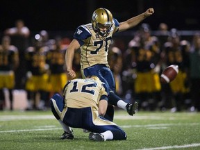 Blue Bombers' Lirim Hajrullahu kicks the game winning extra point against the Hamilton Tiger-Cats during CFL action in Hamilton last year. (Mark Blinch/Reuters)