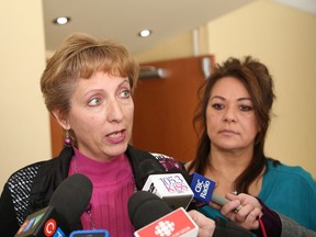 JOHN LAPPA/THE SUDBURY STAR
Nickel Belt MPP France Gelinas, left, makes a point as Sudbury NDP candidate Suzanne Shawbonquit looks on during a media scrum Wednesday.