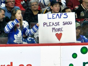 A young Maple Leafs fan offers a suggestion to the struggling team last night at the Canadian Tire Centre in Ottawa. (MATTHEW USHERWOOD/QMI Agency)