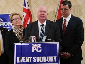 JOHN LAPPA/THE SUDBURY STAR
PC interim leader Jim Wilson, second right, makes a point during a press conference on Wednesday. Looking on are Nipissing MPP Vic Fedeli, left, Sudbury PC candidate Paula Peroni and Lambton-Kent-Middlesex MPP Monte McNaughton.