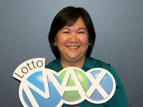 Mary Ann Estanislao of Edmonton, Alta., won $15 million on the October 24, 2014 Lotto Max draw. (Photo Supplied/WCLC)