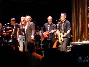 Kingston's Emily Fennell, second from left, backs up Bruce Springsteen during the 15th annual Light of Day fundraiser held at the Paramount Theatre in Asbury Park, N.J., last Saturday. (Photo courtesy of John Cavanaugh)