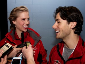 Ice dancers Kaitlyn Weaver and Andrew Poje, both of Waterloo, Ont., laugh during the opening press conference for the 2015 Canadian Tire National Skating Championships at the Rogers K-Rock Centre on Thursday. (Ian MacAlpine/The Whig-Standard)