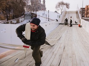 Workers lay the cooling lines on the Crashed Ice circuit in St. Paul, Minn. (Ryan Taylor, Red Bull Content Pool)