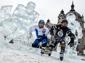 Canadian Scott Croxall, right, and Finnish competitor Paavo Klintrup pose Thursday in St. Paul, Minn., ahead of this weeken's Red Bull Crashed Ice event. Croxall's uniform illustrates the type of advertising competitors can use to raise funds. (Predrag Vukovic, Red Bull Content Pool)