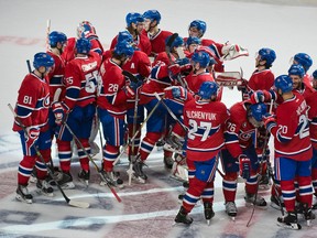 Canadiens players mob defenceman P.K. Subban after he score the overtime winner against the Predators during NHL action in Montreal on Tuesday, Jan. 20, 2015. (Ben Pelosse/QMI Agency)