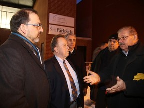 GINO DONATO/THE SUDBURY  STAR/QMI AGENCY
OPSEU President Warren Smokey Thomas, right, talks to Sudbury Liberal candidate Glenn Thibeault and MPP Michael Gravelle on Thursday. OPEU members and supporters were protesting outside the Older Adult Centre, where Thibeault hosted a Northern Summit with several MPPs.