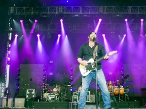 Lee Brice performs during the Boots and Hearts music festival in Bowmanville, Ont. on Friday August 2, 2014. (Pete Fisher/Northumberland Today/QMI Agency)