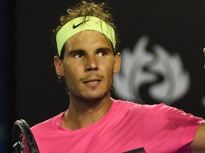 Spain's Rafael Nadal celebrates after victory in his men's singles match against Israel's Dudi Sela. (AFP/MAL FAIRCLOUGH)