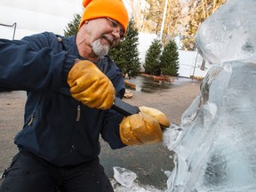 Ice carver Larry Andreoff works on an ice carving of a pirate at the Ice on Whyte site in Edmonton, Alta., on Thursday, Jan. 22, 2015. The Ice on Whyte Ice Carving Festival runs from Jan. 23 to Feb. 1, 2015. Ian Kucerak/Edmonton Sun/ QMI Agency