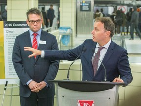 TTC Chair Josh Colle (right) and Deputy CEO/Chief Customer Officer Chris Upfold  unveil the third annual TTC Customer Charter at Bloor-Yonge Station on Jan. 23, 2015. (Ernest Doroszuk/Toronto Sun)